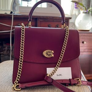 Coach burgundy top handle bag. New.